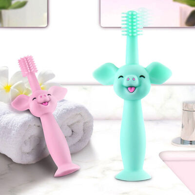 Buy Food Grade Silicone Baby Toothbrush Cartoon Pig Baby Teether Toy Soft Hair Oral Care Training Suction Base online manufacture